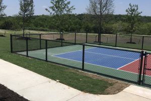 Black fence around court