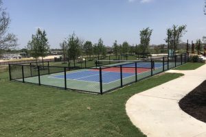 Chain link fence black aroud a court