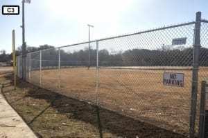 chain link fence by field c 3