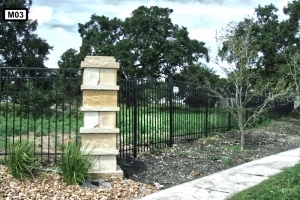 Stone pillars on metal fence- M03 Stone pillars on metal fence- M03