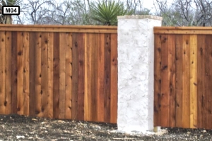 Stone pillars on wooden fence- M04 Stone pillars on wooden fence- M04